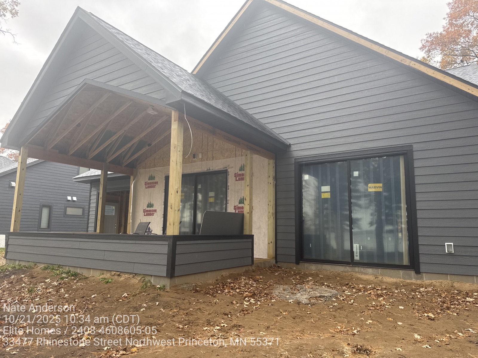 Modern gray home with covered front porch